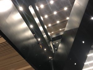 View looking up through the monumental steel floating stair at BU CCDS