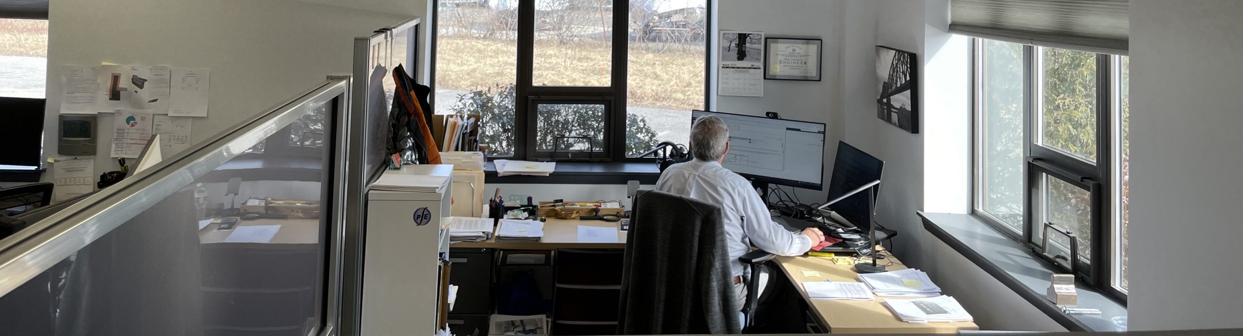 View of people at their workstations in the South Portland office