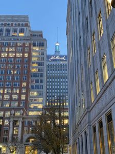 View of the John Hancock Sign atop 200 Berkeley Street, Boston from street level