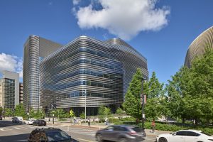 EXP building features distinctive metal ribbons encasing the building.